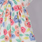 Aomi Blended Poly Cotton Multicolor Flower Print Flutter Sleeve With BowDress - Orange